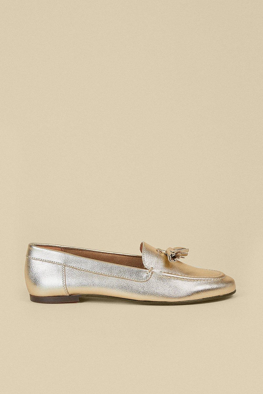 tasseled gold loafers